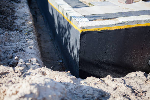 Professional Waterproofing technician working in Allen, MI
